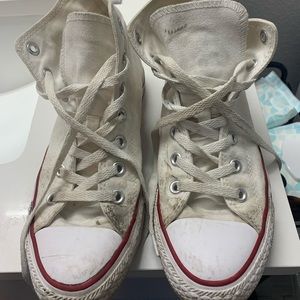 White high top converse.